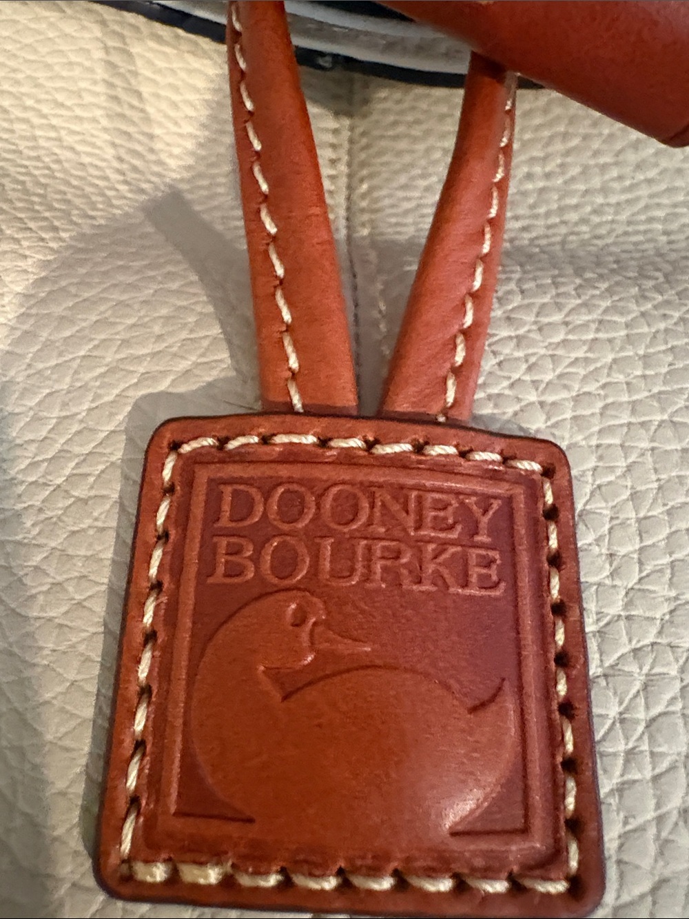 Dooney & Bourke Cream Leather Crossbody with Brown Trim and Toggle Closure - Picture 3 of 9